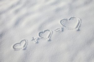 Hearts symbols drawn in the snow